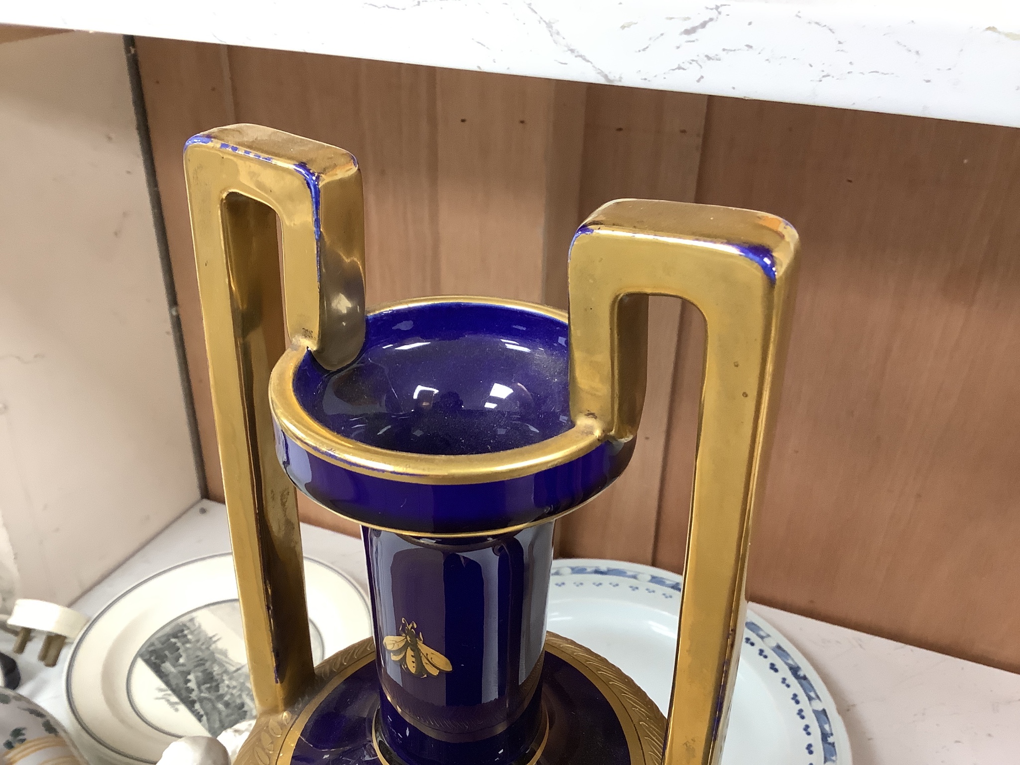 A pair of French gilt blue porcelain two handled vases, height 45cm